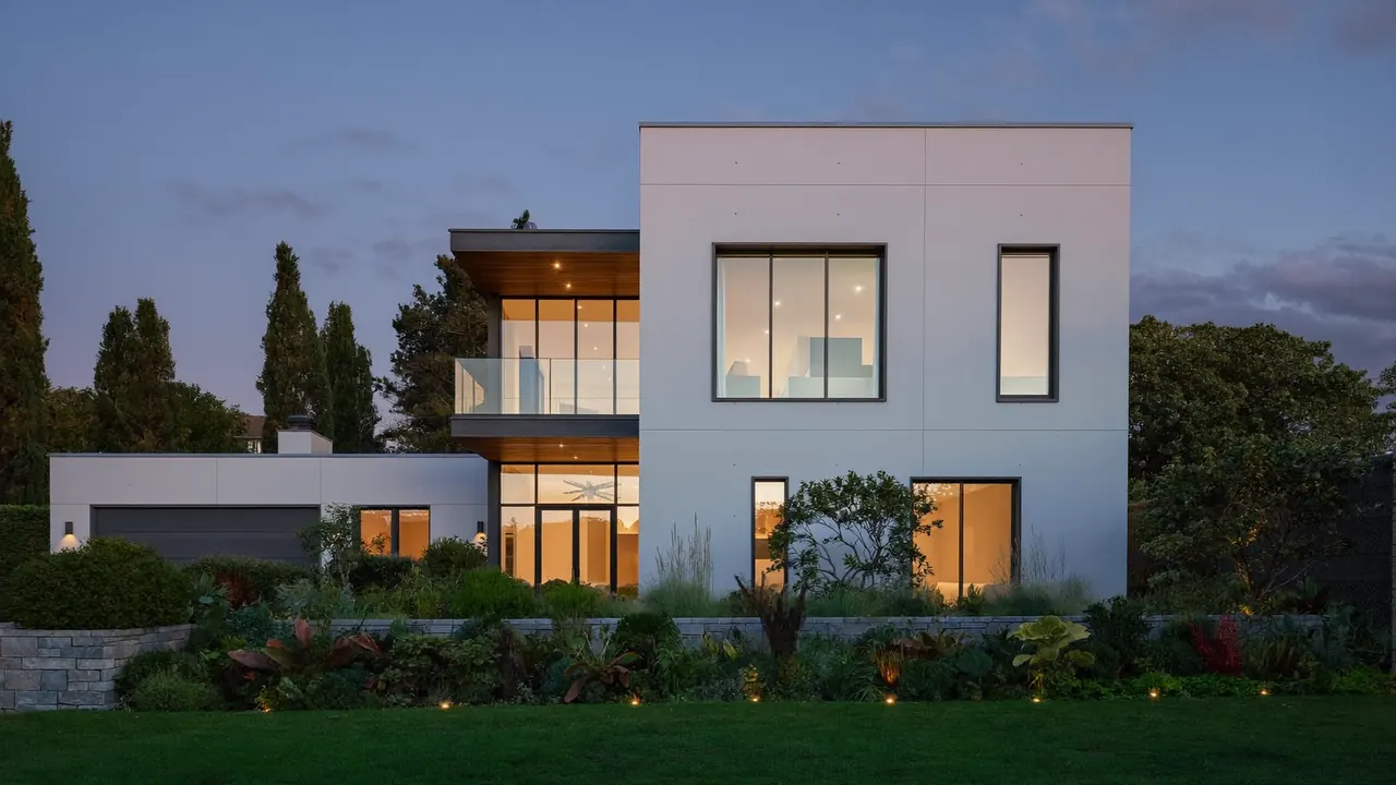 Anthracite grey window frames on a modern rendered house exterior